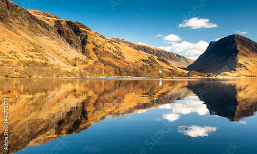 Mirror like reflections on Buttermere in the Lake District 2397