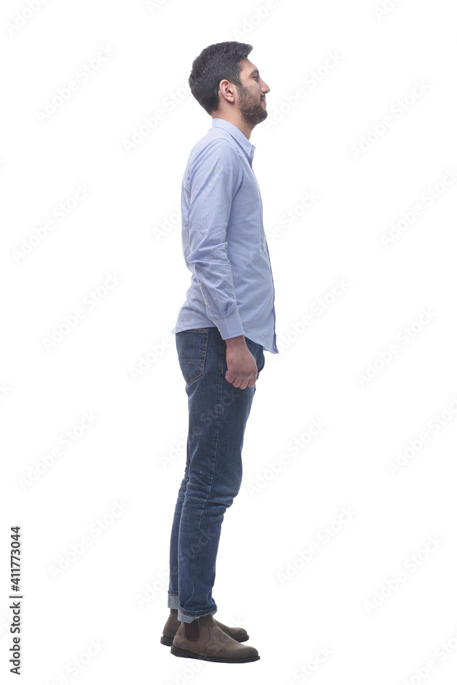 side view . confident young man looking at you. side view . confident young man looking at you.