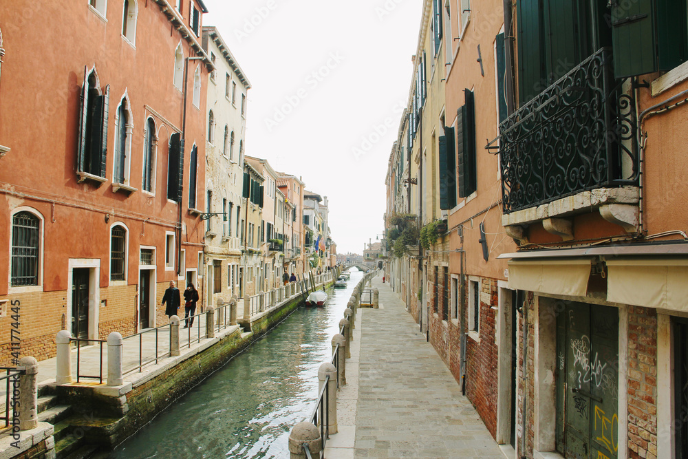 Venice canal view with palaces and water