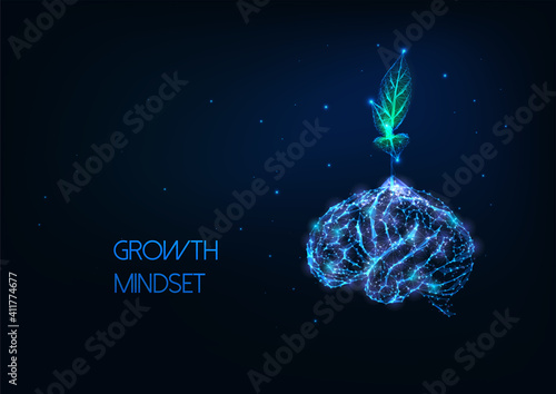 Futuristic growing mindset concept with glowing low polygonal green plant growing from human brain