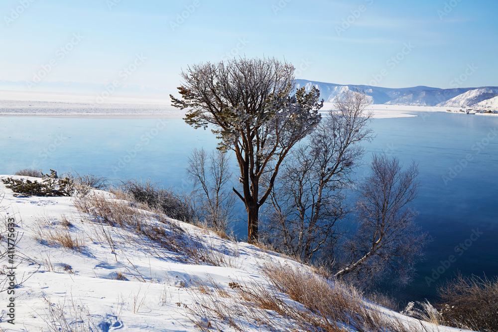 Beautiful winter landscape. The place where the Angara River flows out of Lake Baikal. Beautiful winter landscape. The place where the Angara River flows out of Lake Baikal.
