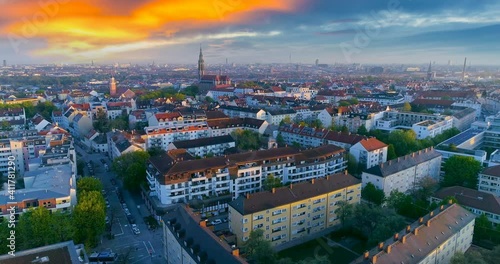 Munich germany beutiful sunrise, munich skyline aerial view drone footage colored sky view of downtown church marienplatz city centre at morning 4k aerial. photo