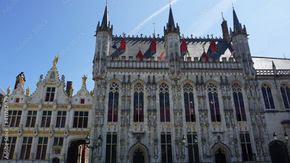 the Brugse Vrije and city hall at the Market Square in Bruges, Belgium, July