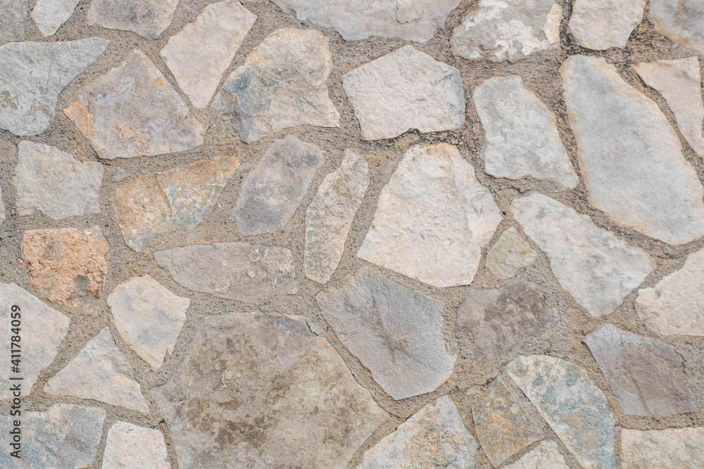 image of mortared stone wall in rural environment image of mortared stone wall in rural environment