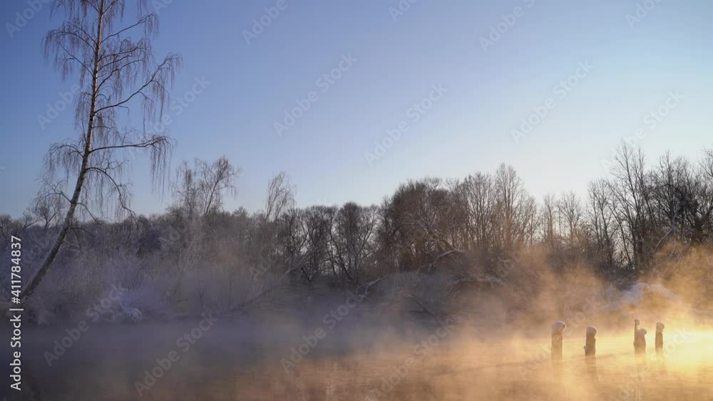 winter sunset on the river with smoke winter sunset on the river with smoke