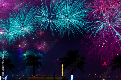 Background image with beautiful colorful firework texture background with different color of fireworks © MSM