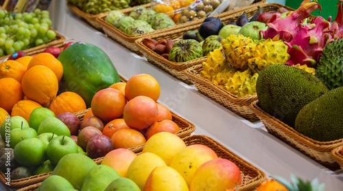 background: Mix of Assorted Fresh fruits at a shop for sale