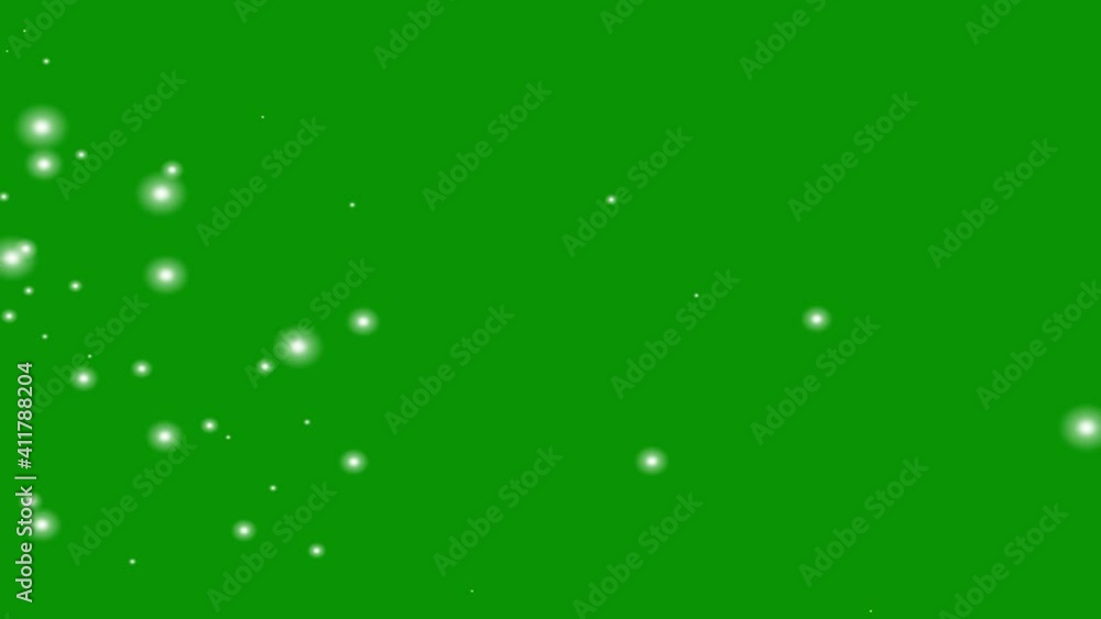 Flying white particles motion graphics with green screen background Flying white particles motion graphics with green screen background