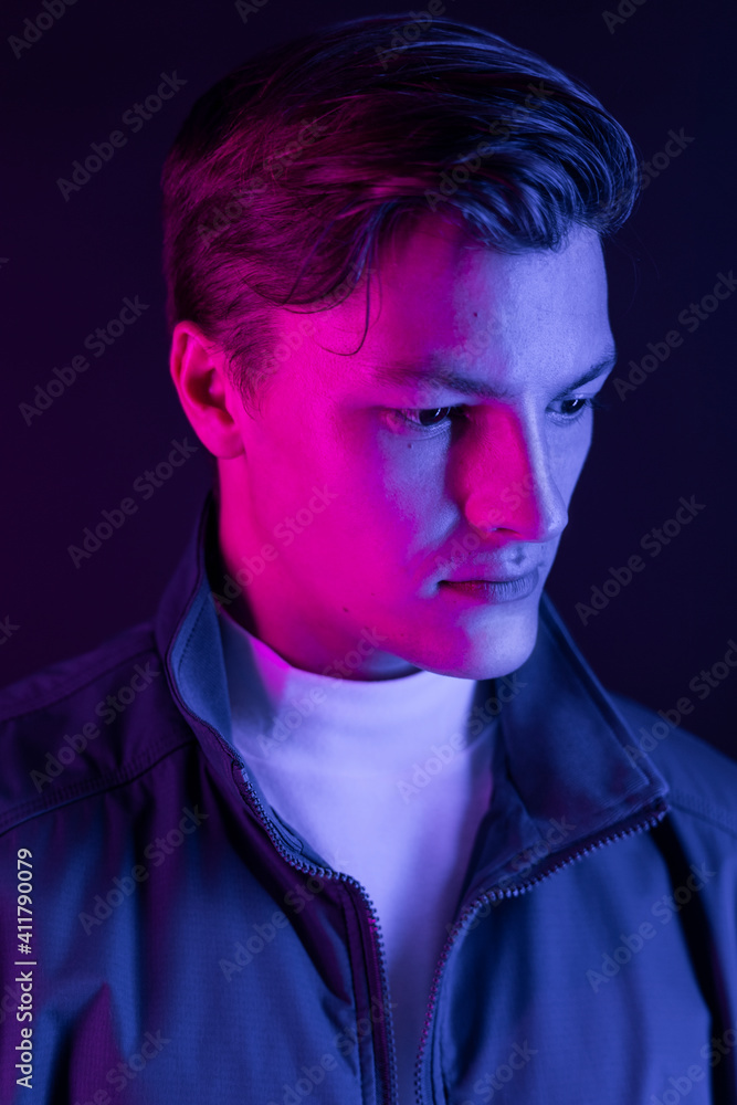 Cyber man with violet neon soft light