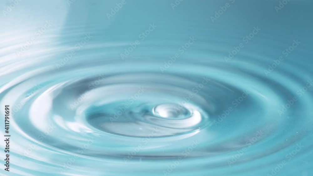 Super Slow Motion of Water Drop at 1000fps. Macro Shot. Super Slow Motion of Water Drop at 1000fps. Macro Shot.