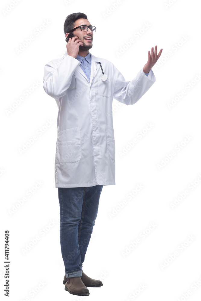 male doctor with a smartphone reading an ad on a white screen. male doctor with a smartphone reading an ad on a white screen.
