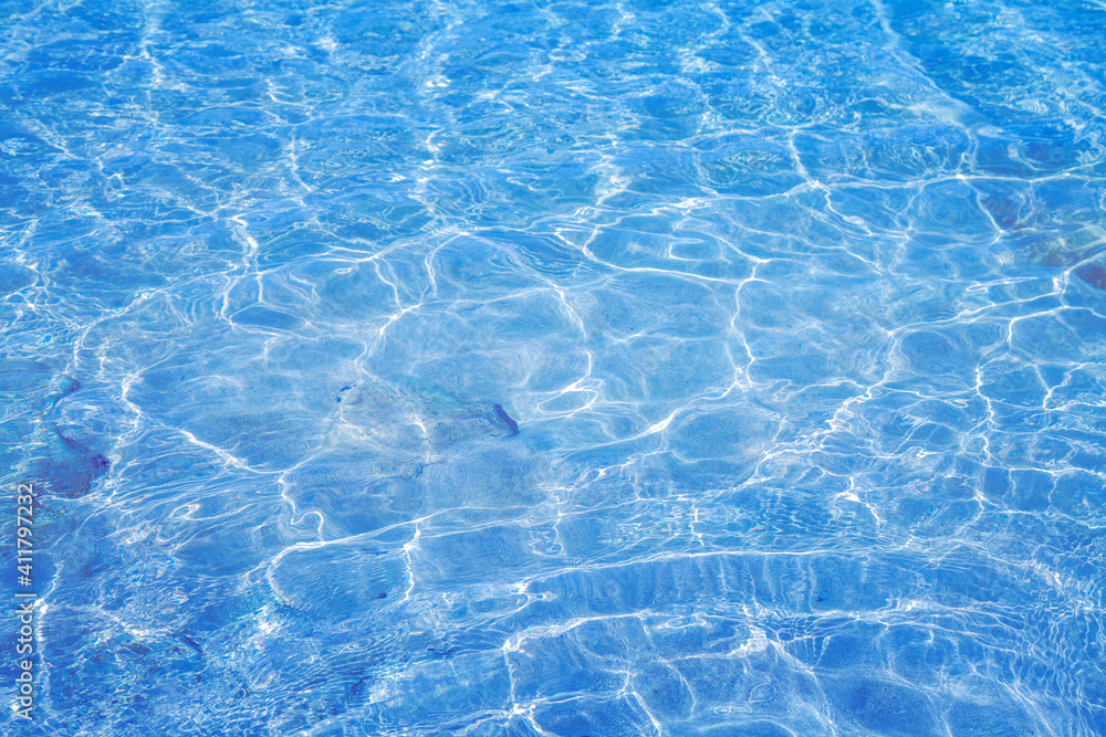 Abstract blue water texture background. Calm sea with clear water