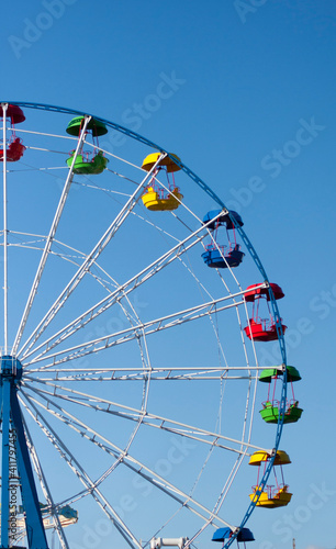 Ferris wheel with colored booths
