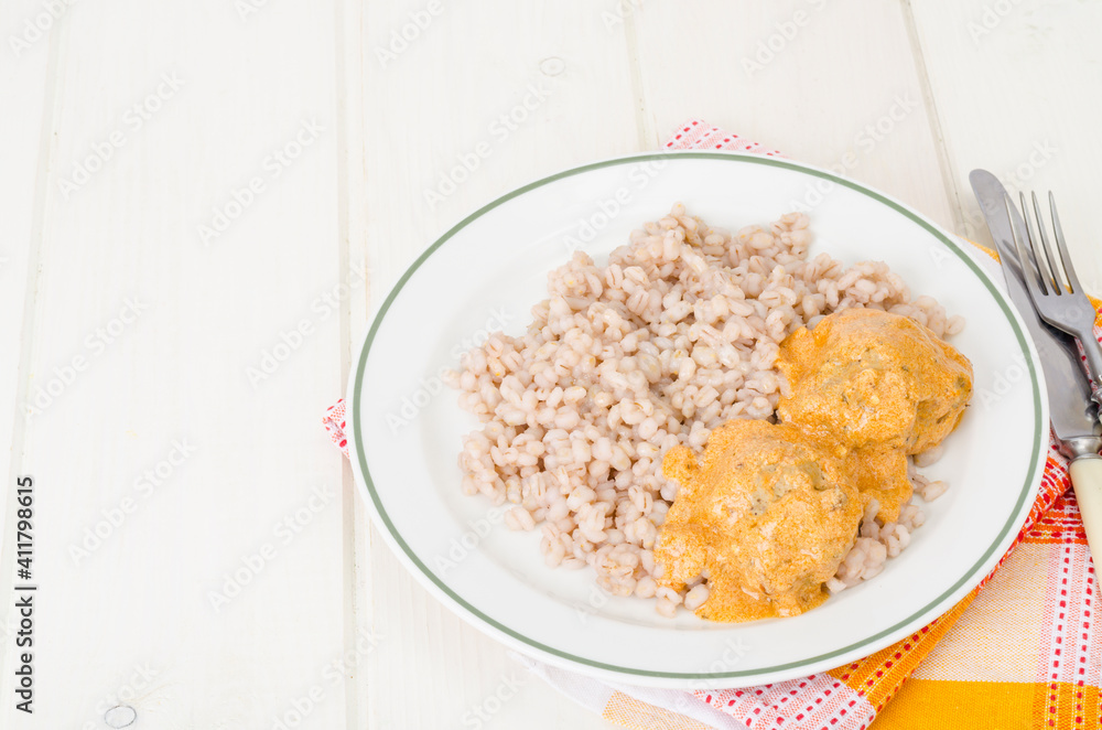 Pearl barley with meat balls. Studio Photo Pearl barley with meat balls. Studio Photo