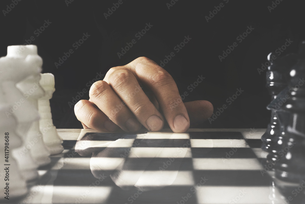 Chess Player Thinks about the Next Move To Make To Win the Game