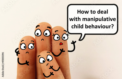 Four fingers are decorated as four person. One of them is asking how to deal with manipulative child behaviour. photo