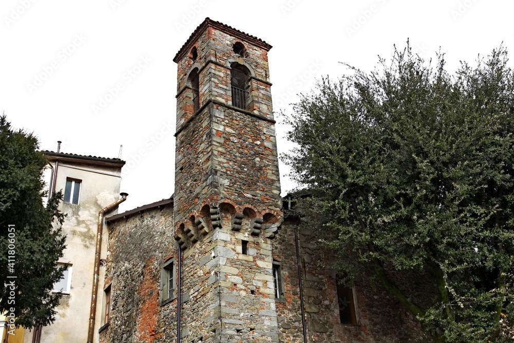 A bell tower in the center of the medieval village of Castelnuovo di Garfagnana, Tuscany, Italy.
