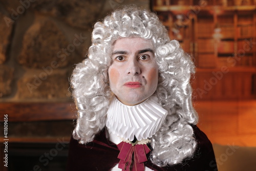 Plakat Baroque man in traditional library 