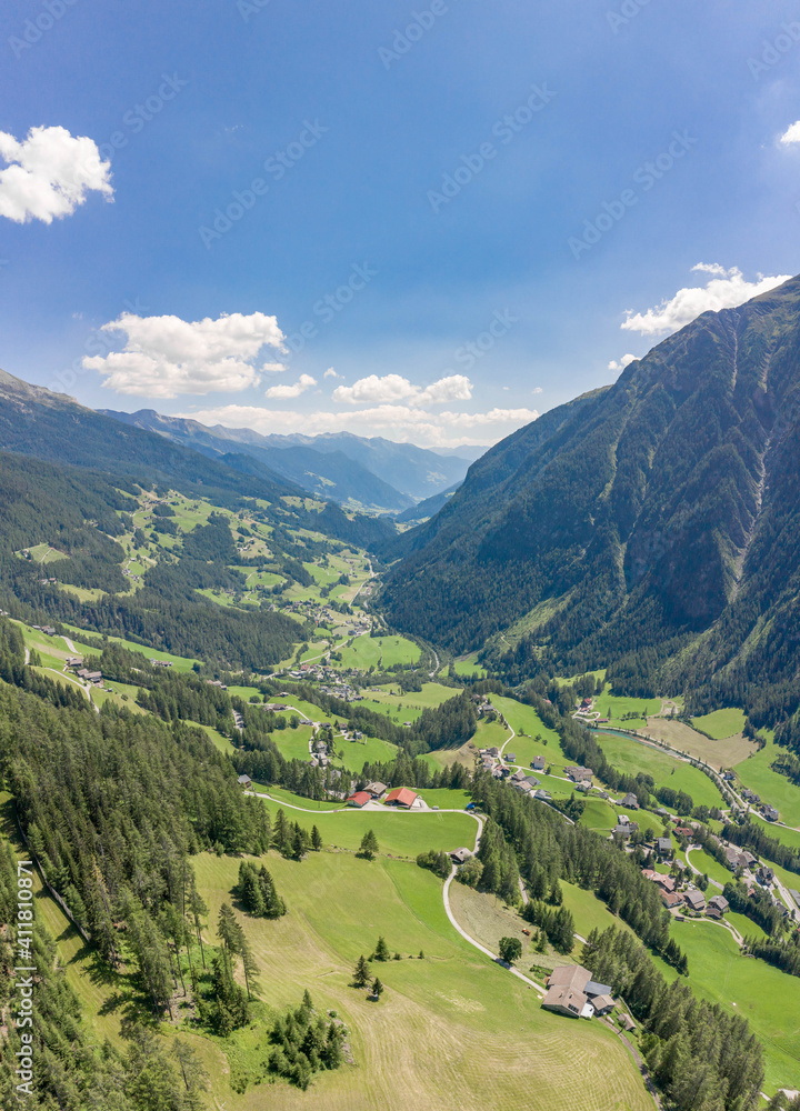 Aerial drone shot of Helligenblutt village in Grossglockner mountain valley in Austria Aerial drone shot of Helligenblutt village in Grossglockner mountain valley in Austria