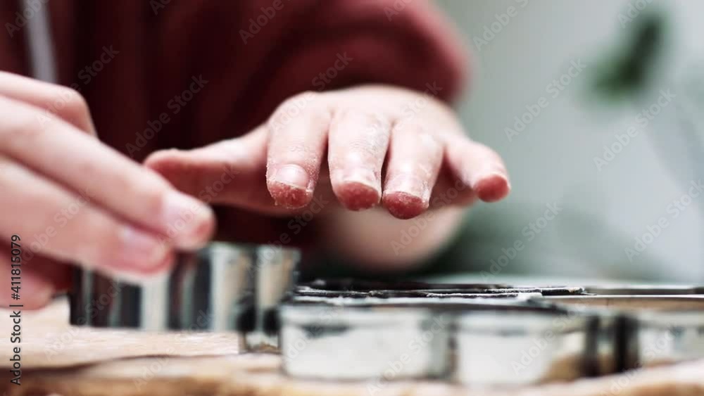 Young girl making cookies or gingerbreads Young girl making cookies or gingerbreads