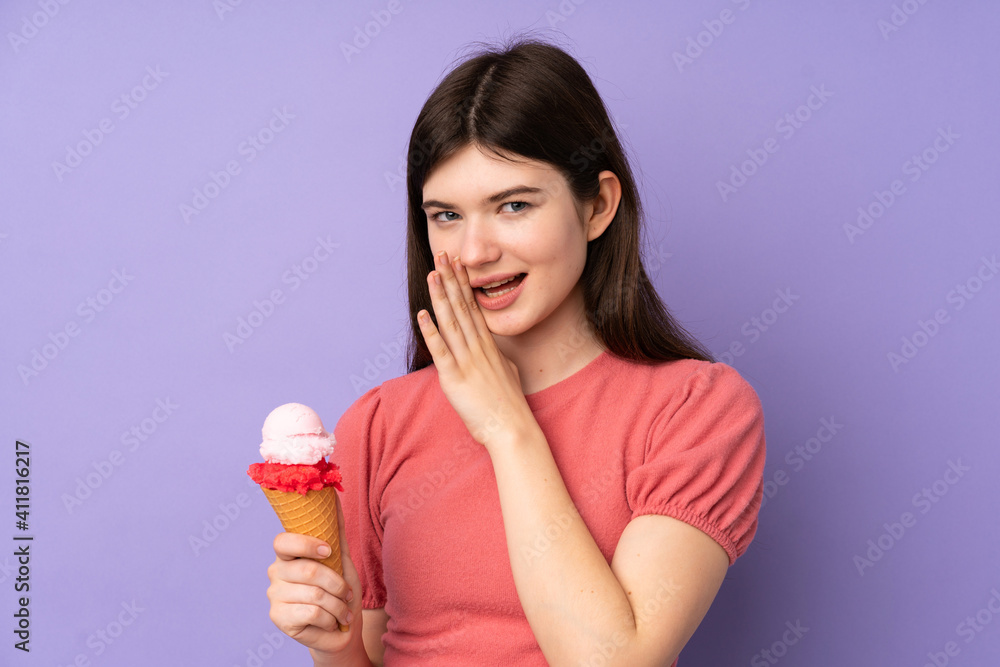 Young Ukrainian teenager girl holding a cornet ice cream over isolated purple background whispering something Young Ukrainian teenager girl holding a cornet ice cream over isolated purple background whispering something