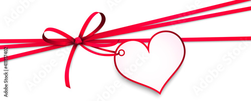 red ribbon bow with heart hang tag