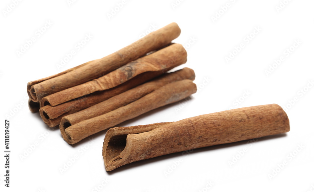 Cinnamon sticks pile isolated on white background