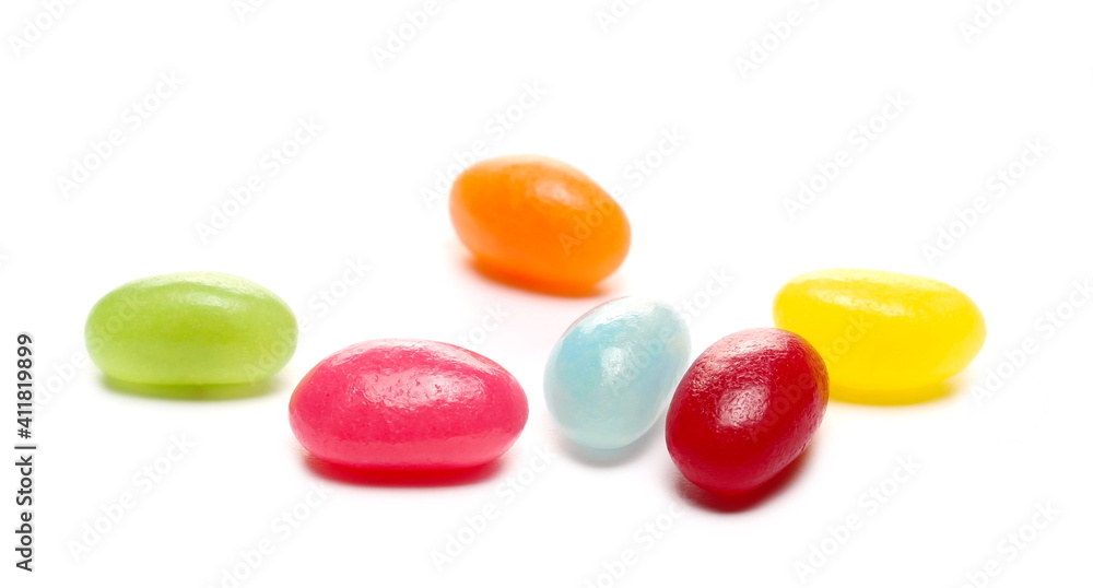 Jelly beans, colorful fruit candy dessert snack pile isolated on white background Jelly beans, colorful fruit candy dessert snack pile isolated on white background
