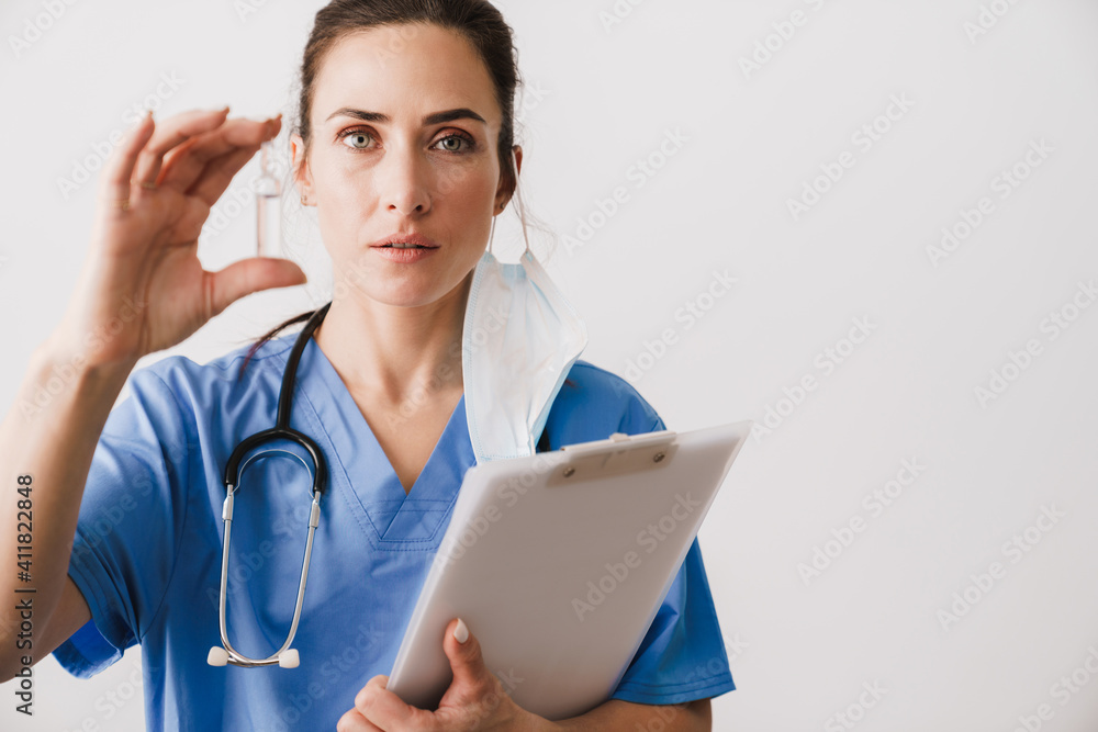 Confident young woman doctor wearing uniform Confident young woman doctor wearing uniform