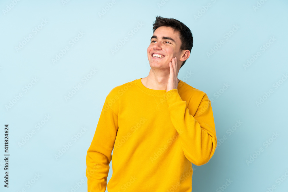 Teenager caucasian handsome man isolated on purple background thinking an idea Teenager caucasian handsome man isolated on purple background thinking an idea