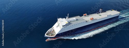 Aerial drone ultra wide photo of large RoRo (Roll on-off) vessel cruising the Mediterranean deep blue sea