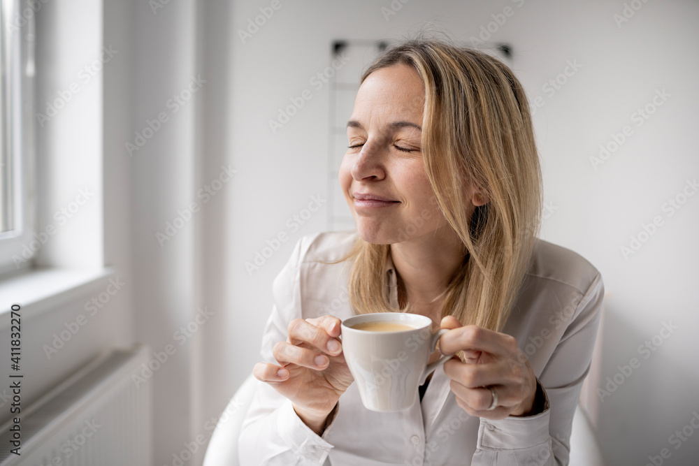 Business woman enjoy coffee break while working in 5office Business woman enjoy coffee break while working in 5office