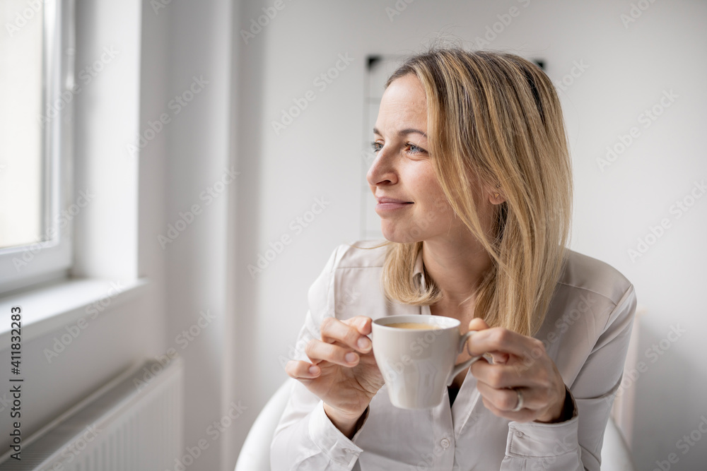 Business woman enjoy coffee break while working in 5office Business woman enjoy coffee break while working in 5office