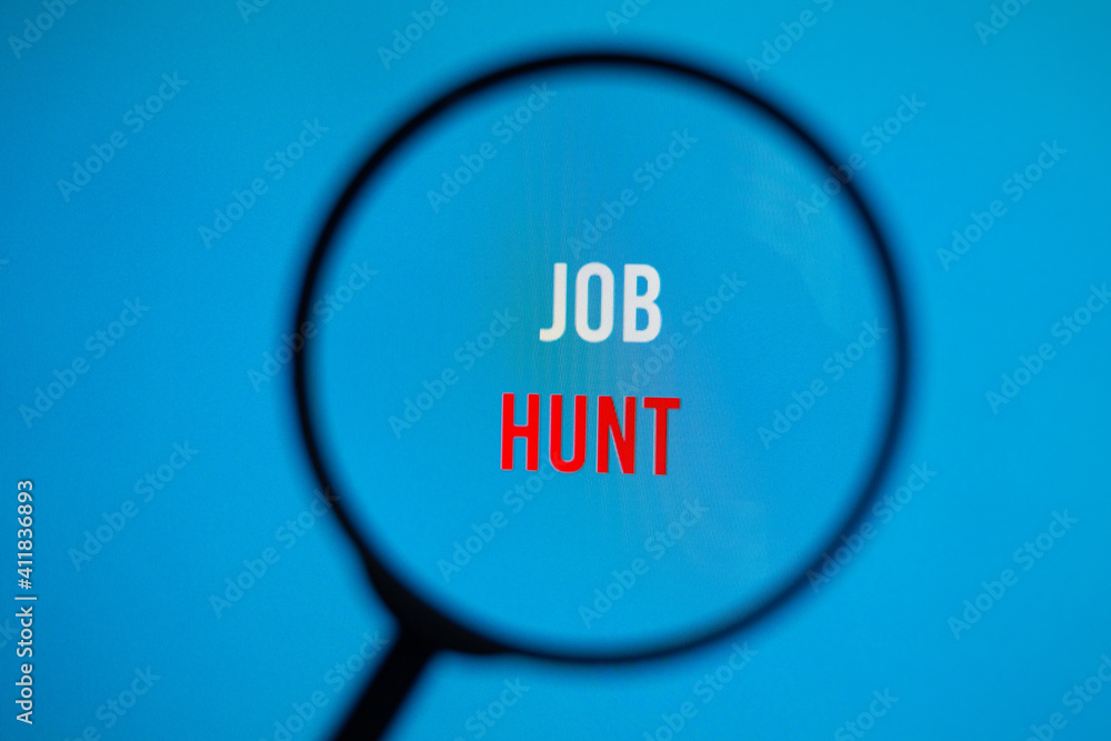 Text job hunt on blue screen through magnifying glass. We hiring Text job hunt on blue screen through magnifying glass. We hiring