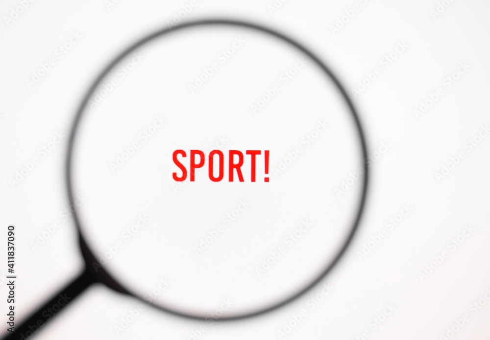 Text sport on white screen through magnifying glass. Healthy lifestyle Text sport on white screen through magnifying glass. Healthy lifestyle
