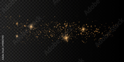 The dust is yellow. yellow sparks and golden stars shine with special light. Vector sparkles on a transparent background.