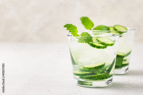 Summer soft drink, regreshing cucumber iced cocktail. Space for text.