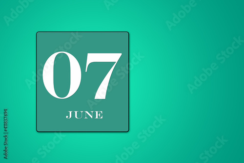 June 7 is the seventh day of the month. calendar date framed on a green background