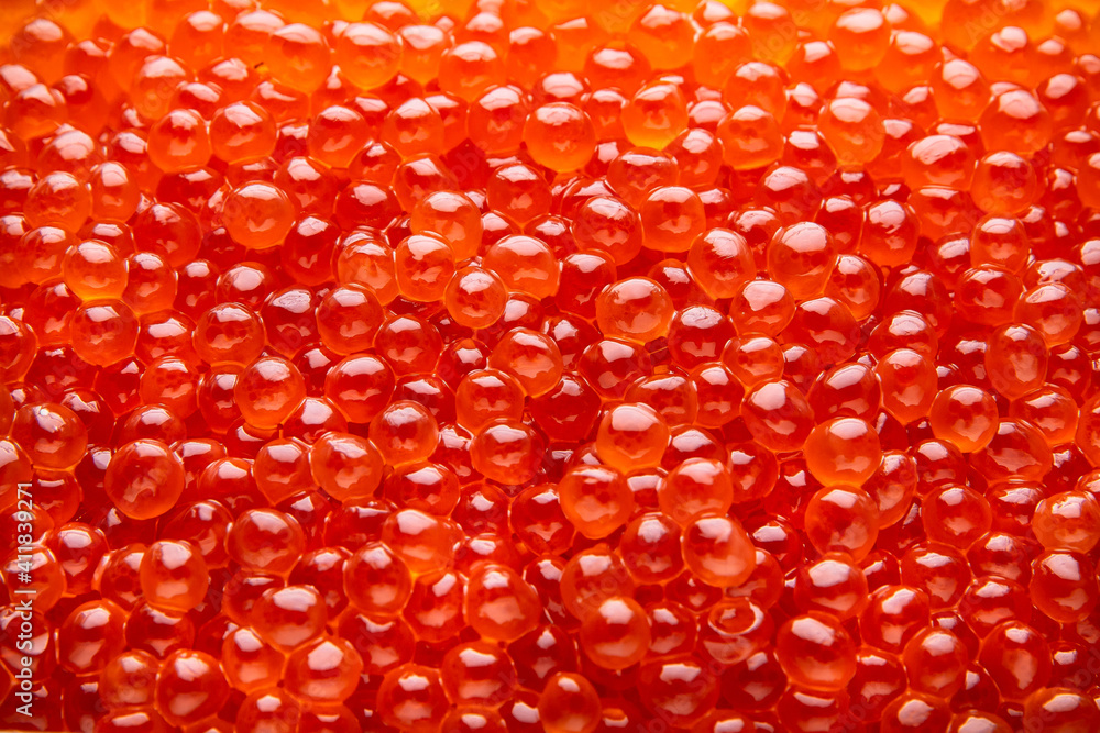 Red caviar selective focus. Pattern. Delicacy product of the highest quality. Red caviar selective focus. Pattern. Delicacy product of the highest quality.