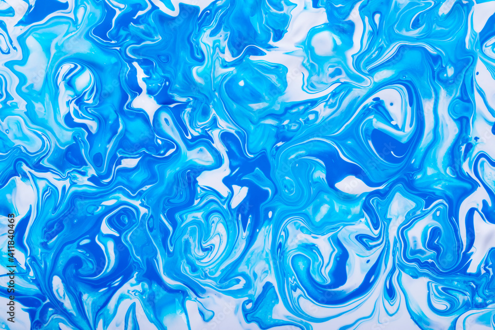 Free flowing blue and white acrylic paint 2. Random Waves and Curls. Abstract marble background or texture. Free flowing blue and white acrylic paint 2. Random Waves and Curls. Abstract marble background or texture.