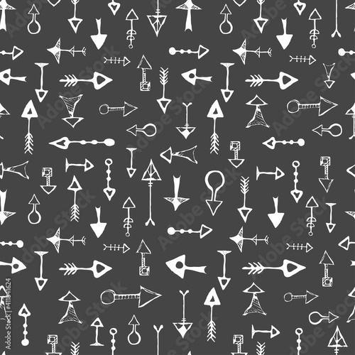 Vector hand drawn seamless pattern with different arrows. Black and white repeated texture with arrows. Hand-drawn background.