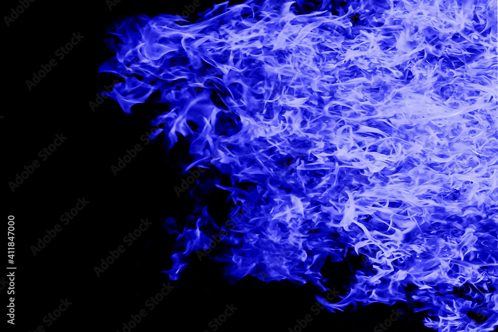 Blue flame on black background