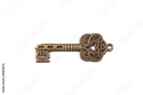 Old antique key on white ba...