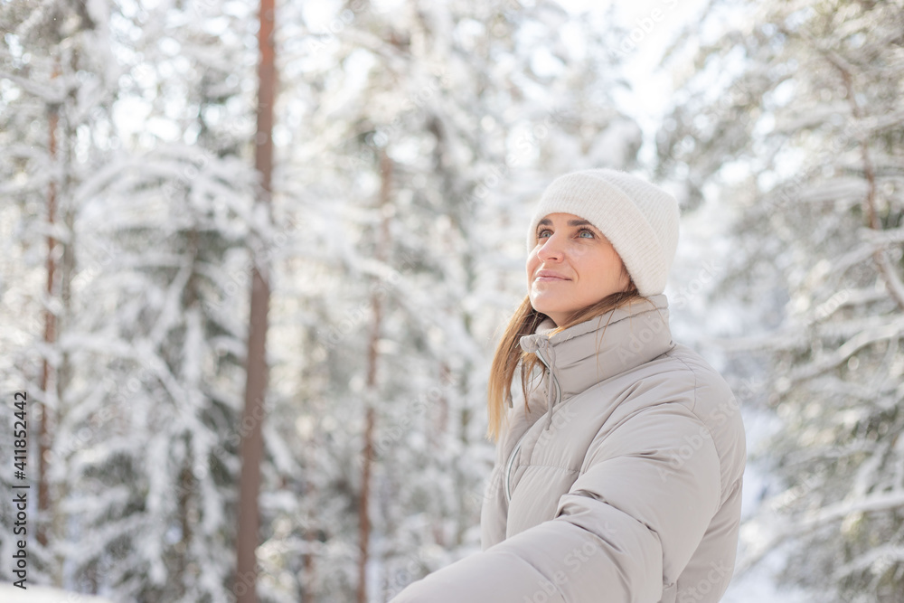 Portrait of Happy woman traveler on the top of mountain and looking on beautiful winter snowy view. Portrait of Happy woman traveler on the top of mountain and looking on beautiful winter snowy view.