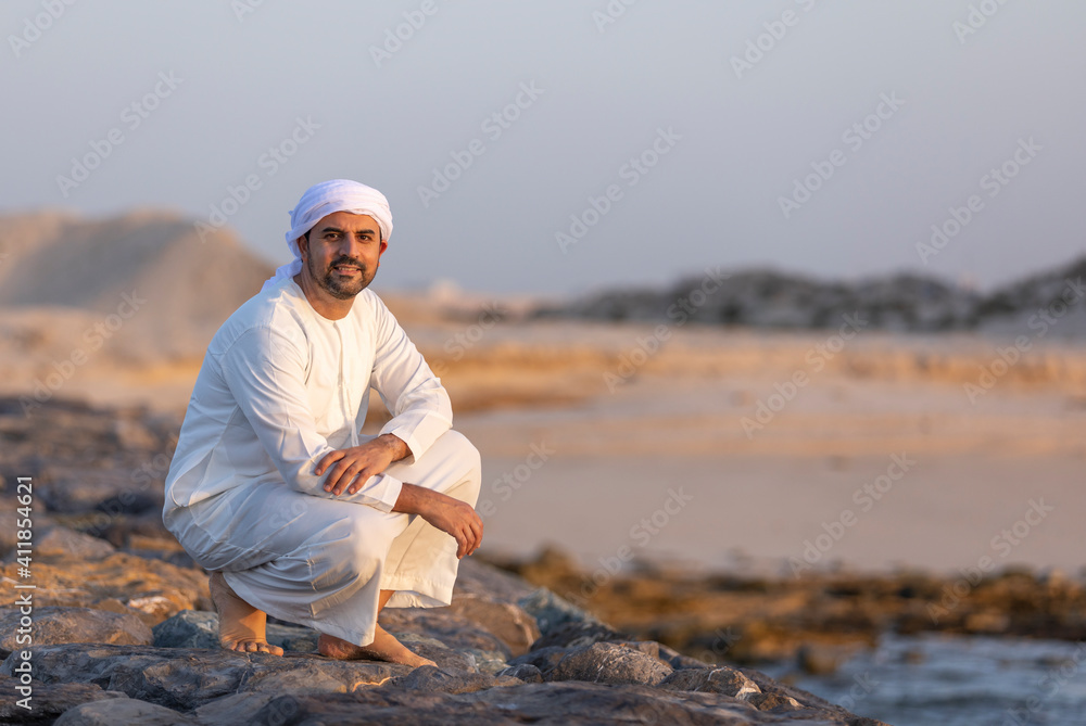 emirati man on the beach