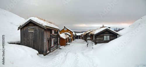 Snow covered street and buildings in Roros Norway