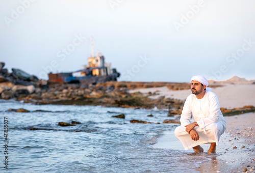 emirati man on the beach