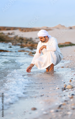 emirati man on the beach