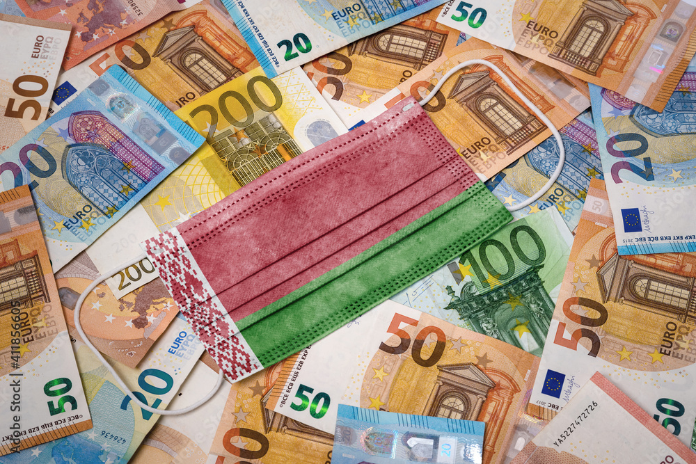 Medical mask with the flag of Belarus on a variety of european banknotes.(series) Medical mask with the flag of Belarus on a variety of european banknotes.(series)