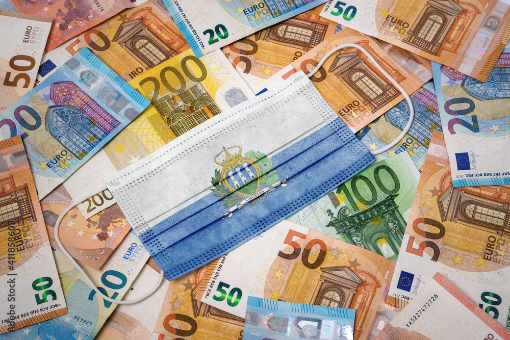 Medical mask with the flag of San Marino on a variety of european banknotes.(series) Medical mask with the flag of San Marino on a variety of european banknotes.(series)